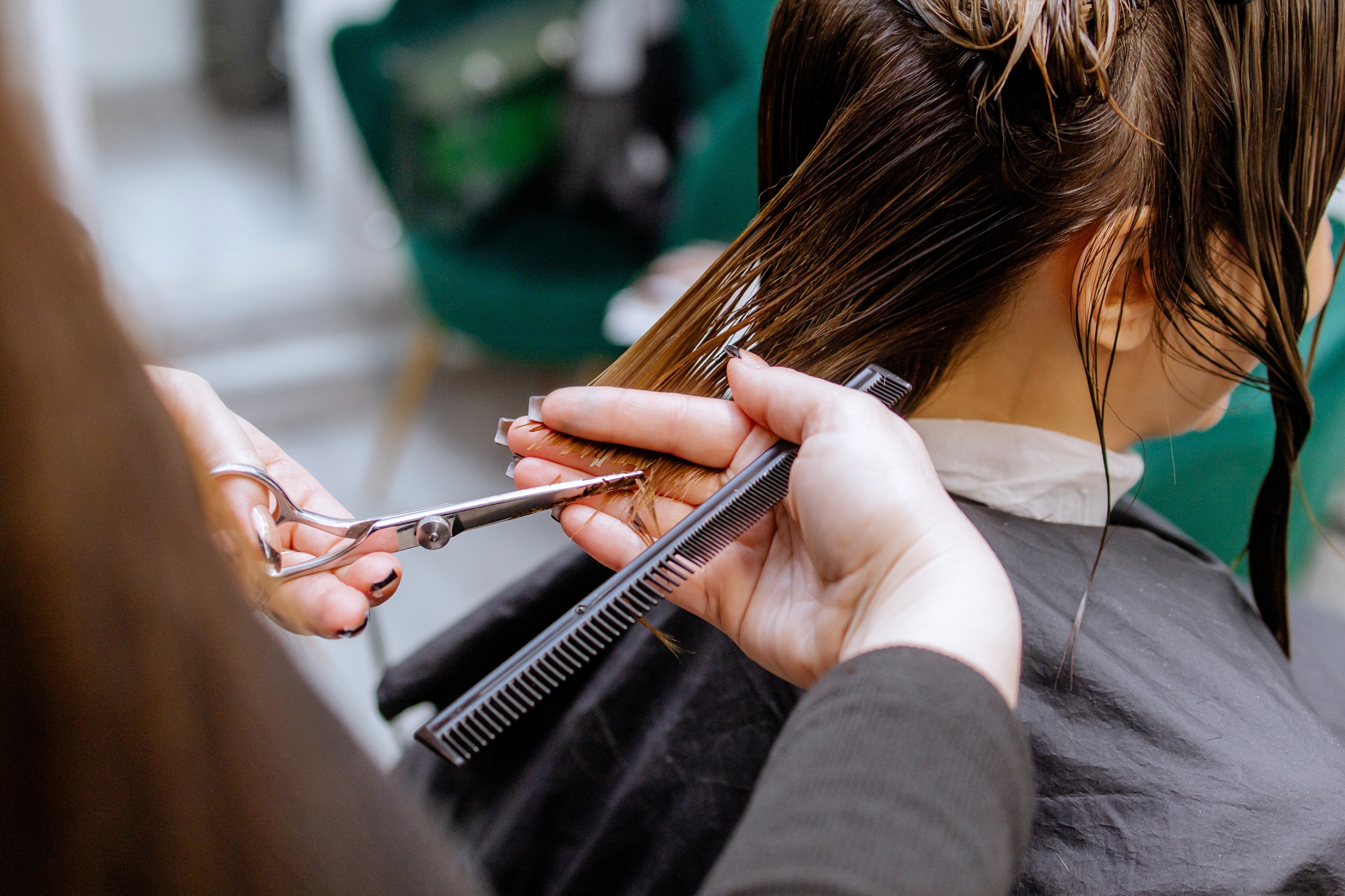 Barber consulting with client
